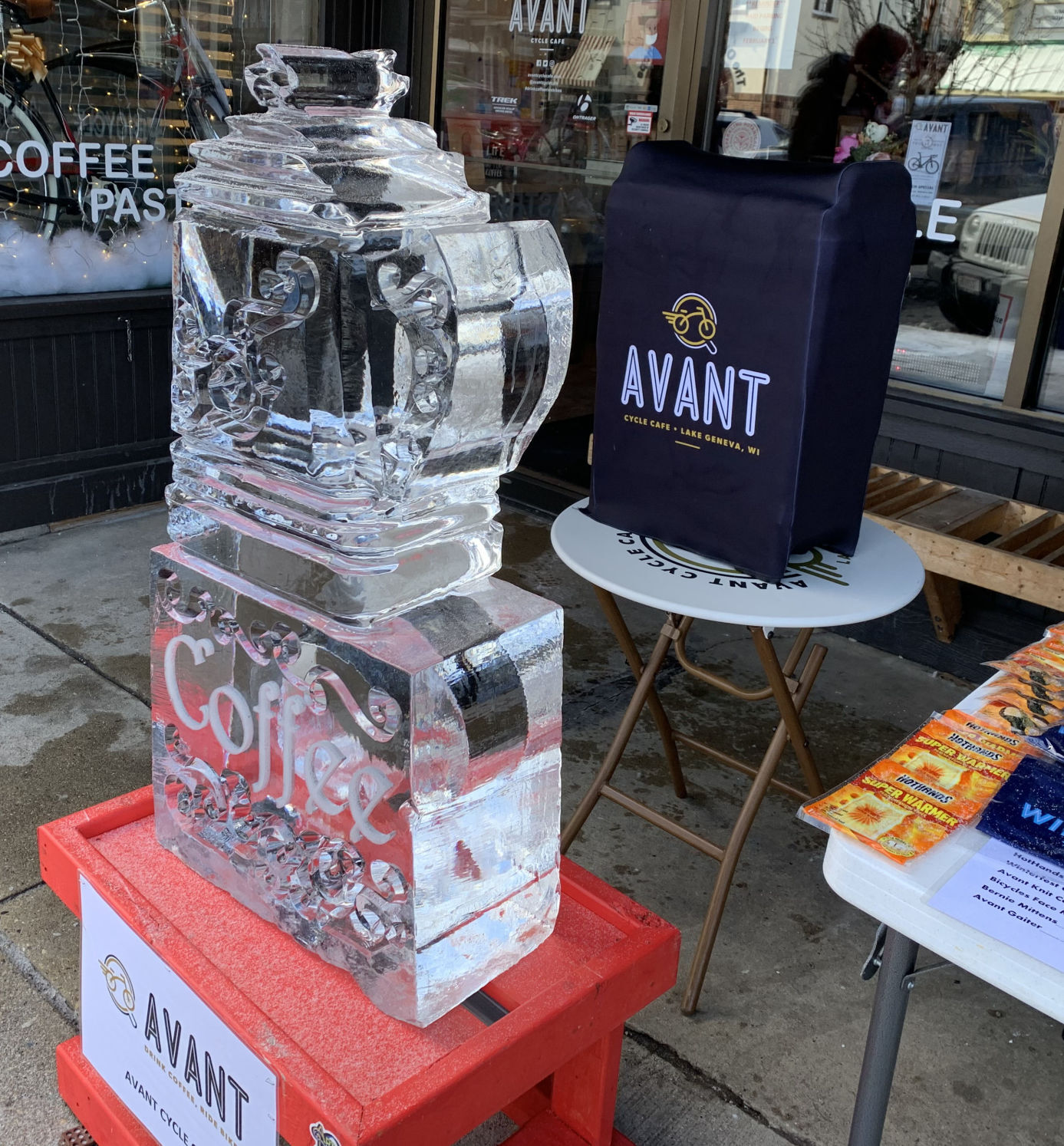 Avant Cycle Cafe had an ice sculpture depicting a mug of coffee or hot beverage in front of its storefront
